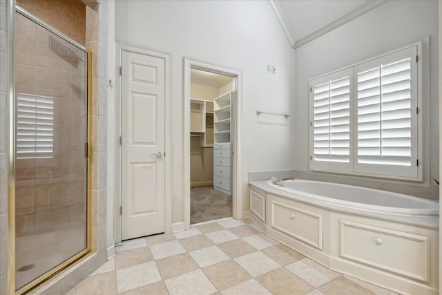 bathroom with ornamental molding, lofted ceiling, and independent shower and bath