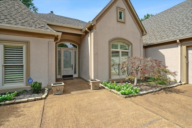 property entrance with a patio area