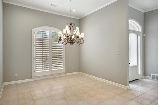 unfurnished room featuring ornamental molding and a chandelier