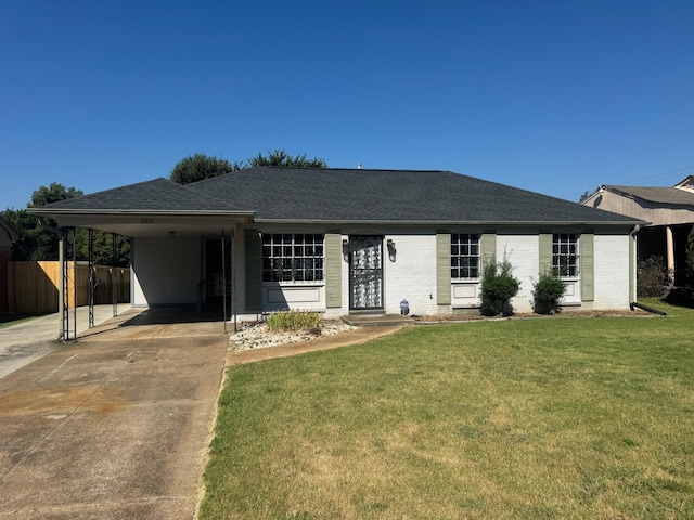 ranch-style home with a front lawn and a carport