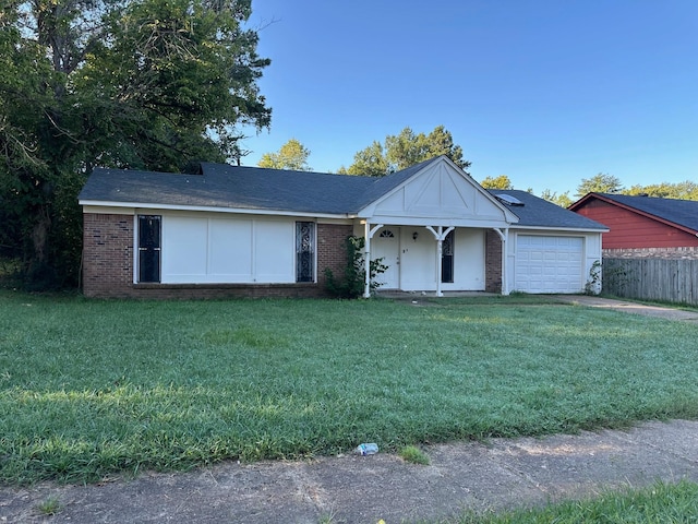 single story home with a garage and a front yard