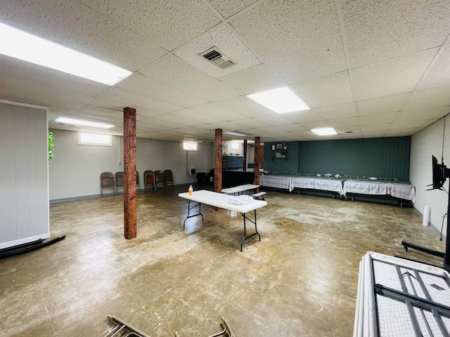 basement with a drop ceiling