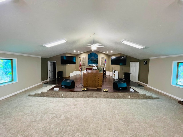 carpeted bedroom featuring lofted ceiling, a textured ceiling, and crown molding