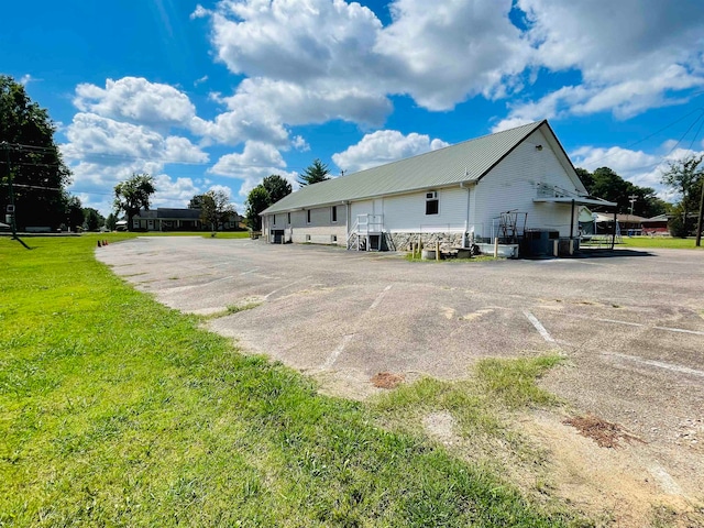 exterior space with a yard