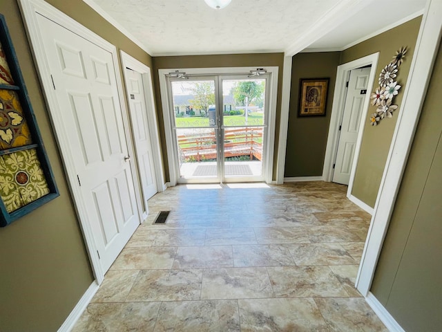 corridor featuring crown molding