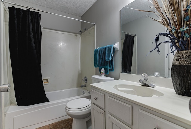 full bathroom featuring toilet, shower / bathtub combination with curtain, tile patterned floors, a textured ceiling, and vanity