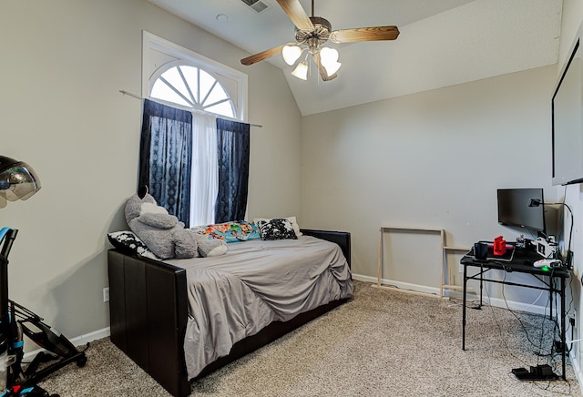 carpeted bedroom with ceiling fan and lofted ceiling