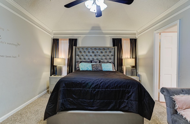 carpeted bedroom with a textured ceiling, ceiling fan, and crown molding