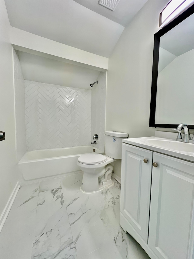 full bathroom with tiled shower / bath, vanity, lofted ceiling, and toilet