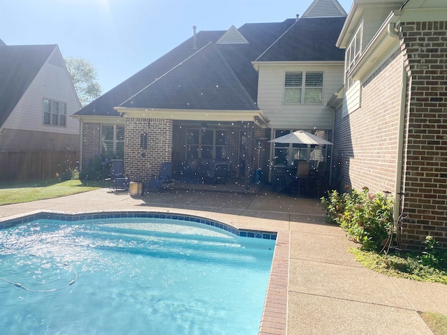 view of pool featuring a patio