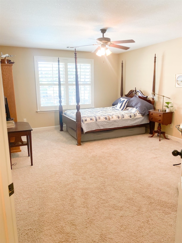 bedroom featuring carpet floors and ceiling fan