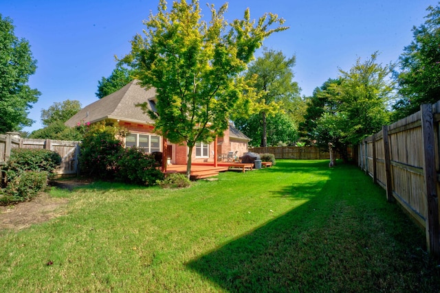 view of yard with a deck