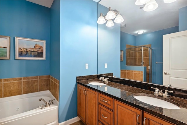 bathroom featuring vanity and separate shower and tub