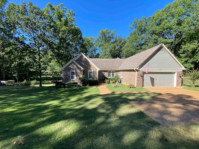 ranch-style home with a garage, brick siding, driveway, and a front lawn