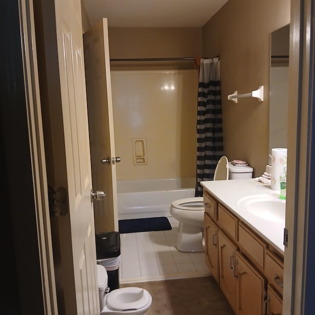 full bathroom featuring shower / bath combo, vanity, toilet, and tile patterned floors