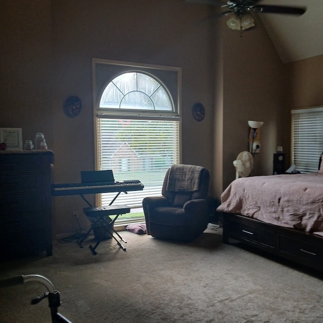 bedroom featuring carpet flooring, ceiling fan, and high vaulted ceiling