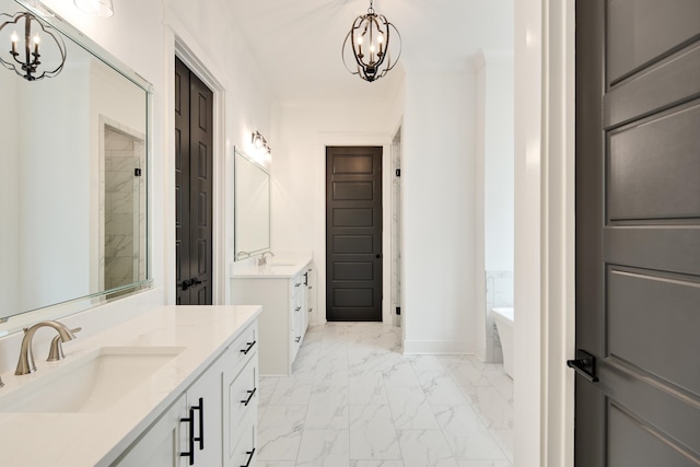 bathroom featuring a notable chandelier, vanity, and separate shower and tub