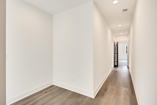 hallway featuring light hardwood / wood-style floors