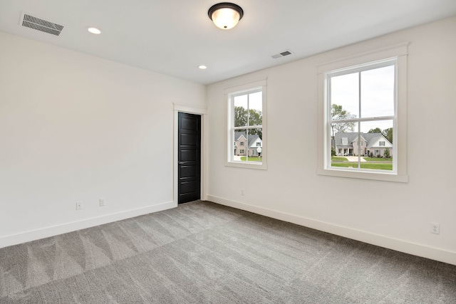 spare room with carpet flooring