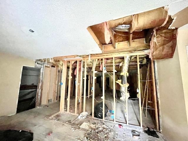 miscellaneous room featuring a textured ceiling