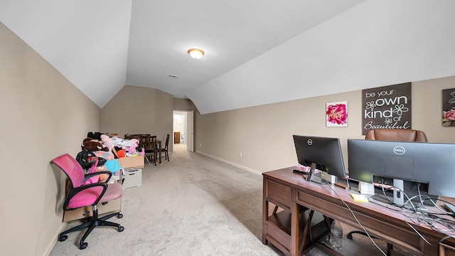 office area featuring carpet flooring and lofted ceiling