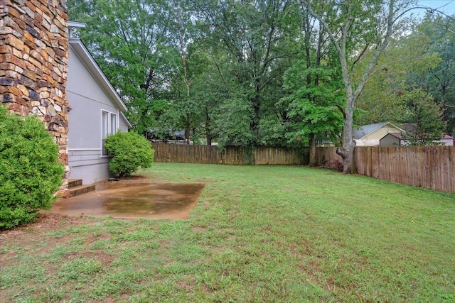 view of yard with a patio area