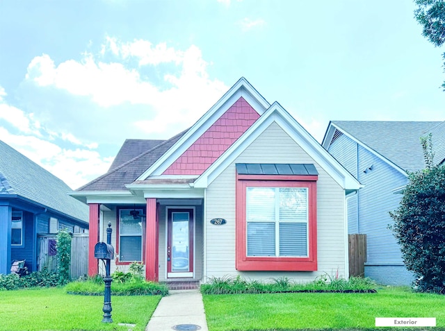 view of front of property with a front lawn