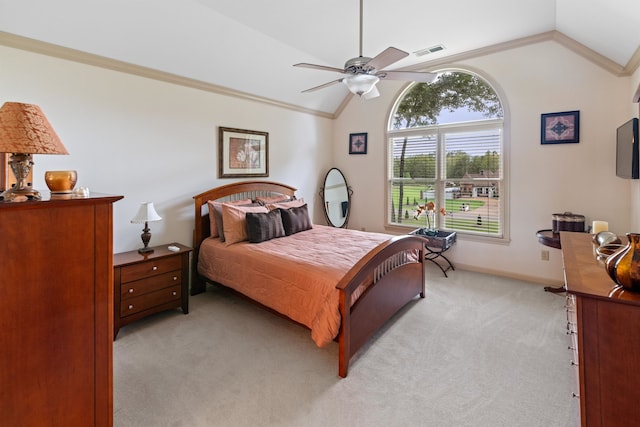 bedroom with light carpet, lofted ceiling, ceiling fan, and crown molding