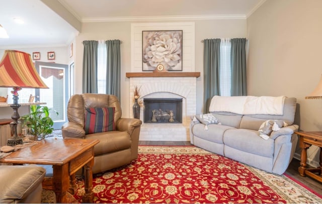 living room with ornamental molding, a fireplace, and a healthy amount of sunlight