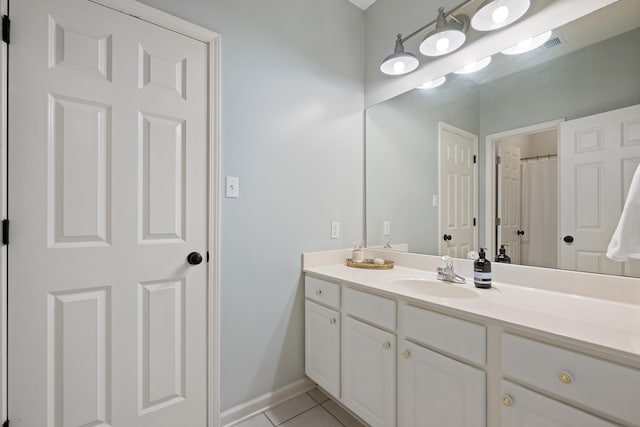 bathroom featuring vanity and tile patterned floors