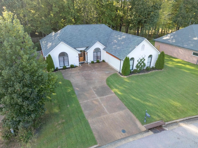 exterior space with a front lawn