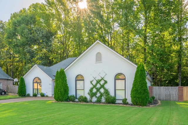 view of front of home with a front yard