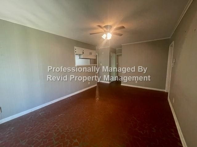 unfurnished room with ceiling fan