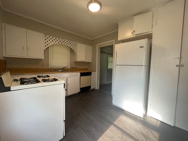 kitchen featuring white cabinets, ornamental molding, sink, white appliances, and dark hardwood / wood-style flooring