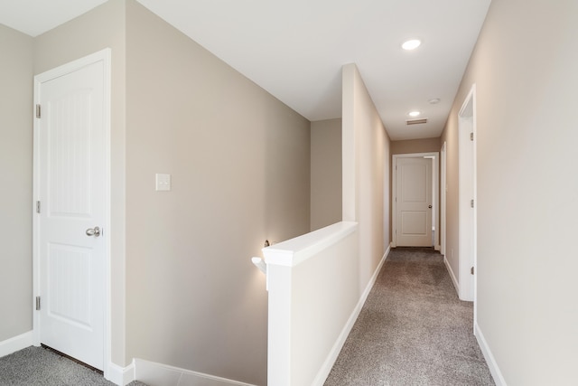 corridor featuring carpet floors