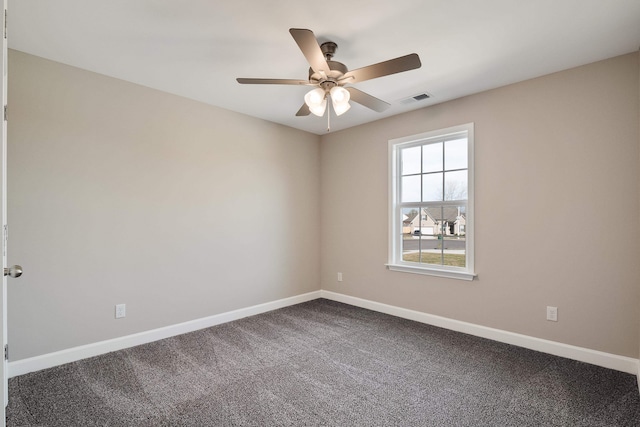 unfurnished room featuring carpet floors and ceiling fan