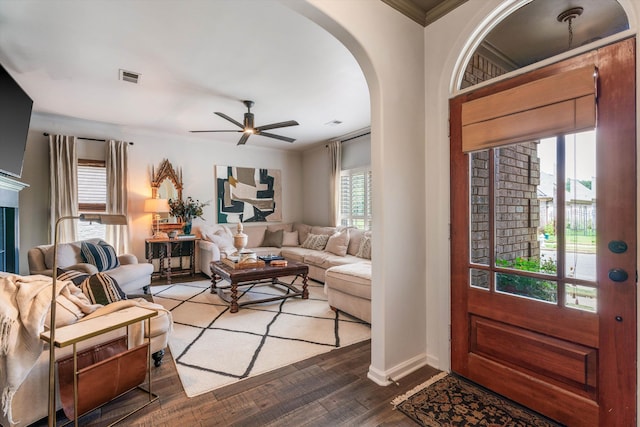 foyer featuring ornamental molding, ceiling fan, and hardwood / wood-style flooring