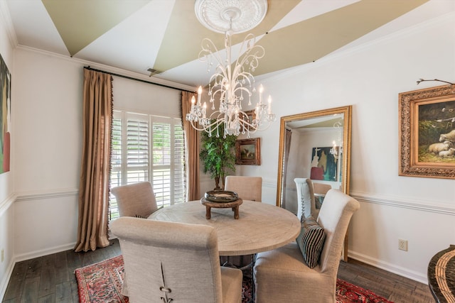 dining space featuring an inviting chandelier, vaulted ceiling, ornamental molding, and dark hardwood / wood-style flooring