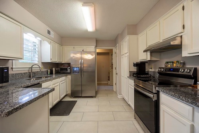 kitchen with white cabinetry, stainless steel appliances, ventilation hood, a textured ceiling, and sink