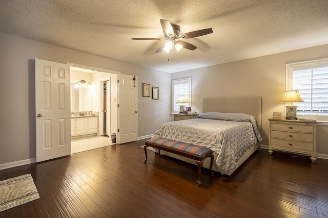 7150 Woodridge Ln, Germantown, TN 38138 - bedroom with hardwood / wood-style flooring, baseboards, and multiple windows