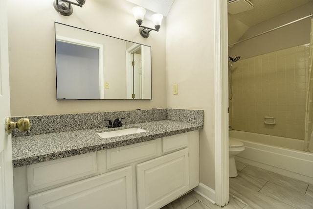 7150 Woodridge Ln, Germantown, TN 38138 - bathroom with toilet, vanity, and shower / washtub combination