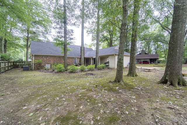 7150 Woodridge Ln, Germantown, TN 38138 - exterior space with brick siding, fence, and a shingled roof