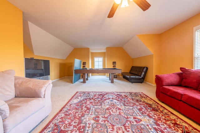 living room with carpet, ceiling fan, and plenty of natural light