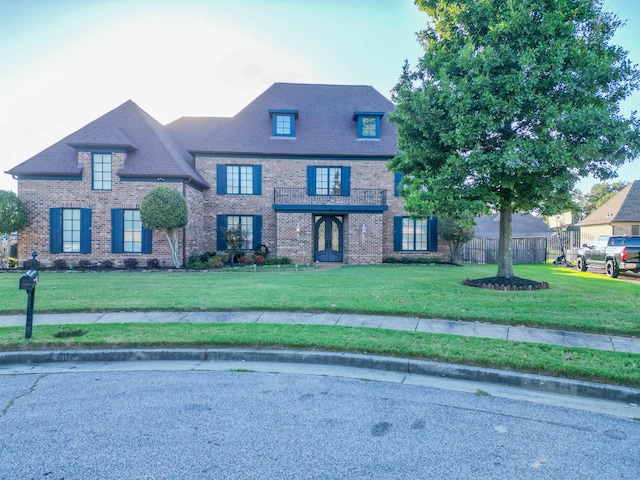 view of front of home with a front yard