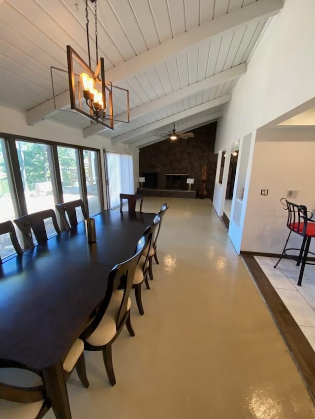 dining space with wooden ceiling, ceiling fan with notable chandelier, a large fireplace, and vaulted ceiling with beams