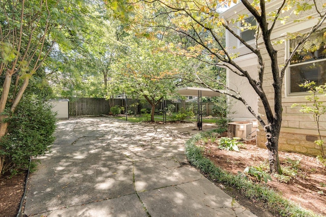 view of patio featuring central AC unit