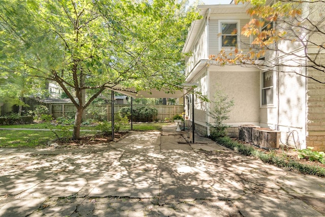 view of patio featuring central AC