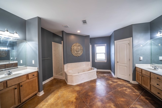 bathroom featuring vanity and a bath