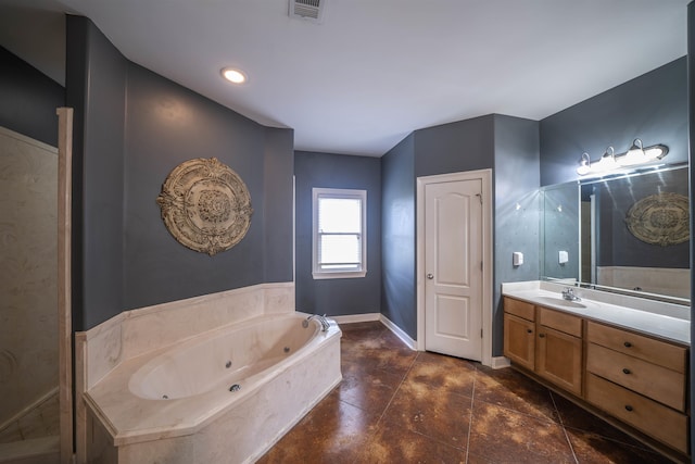 bathroom featuring vanity and a bathing tub