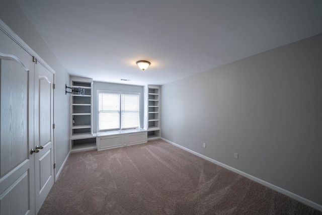 spare room with carpet flooring